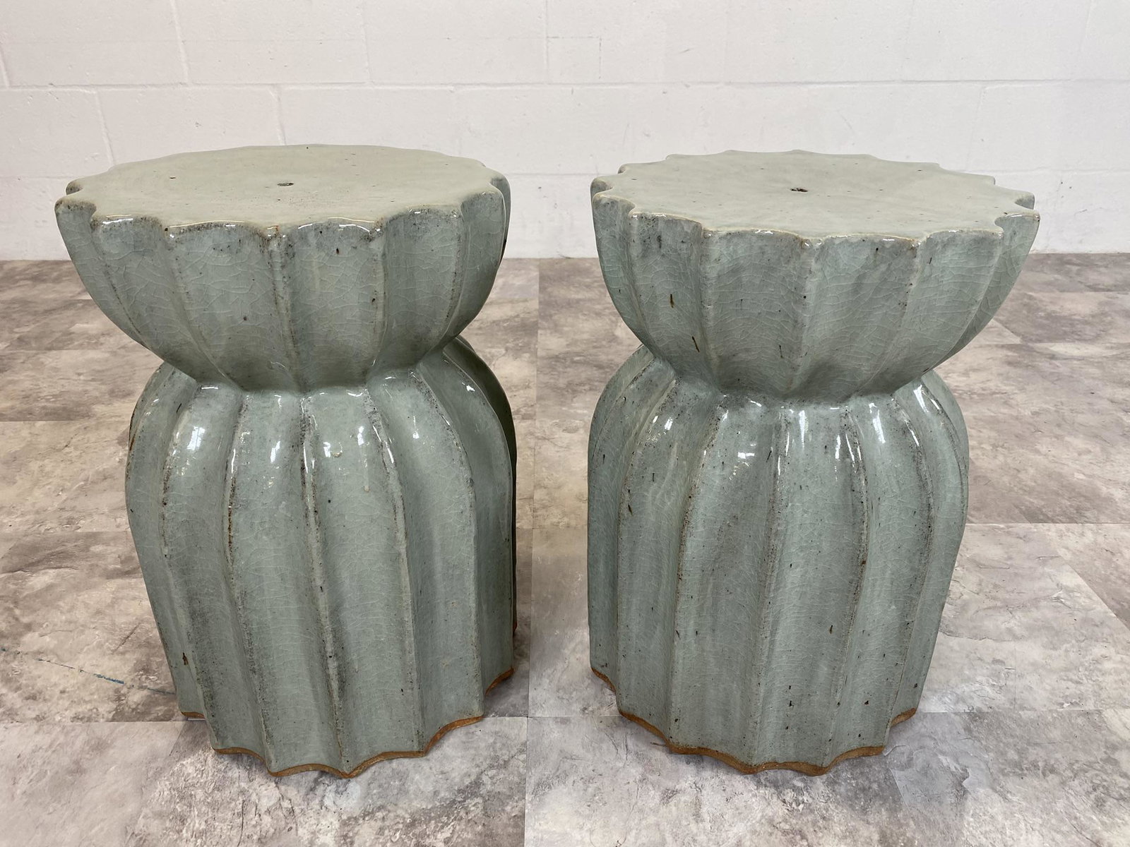 PAIR OF GARDEN STOOLS: GLAZED POTTERY GARDEN STOOLS WITH FLUTED DESIGNS. 13"DIA., 18"H, 35 LBS EACH. TRANQUIL BLUE