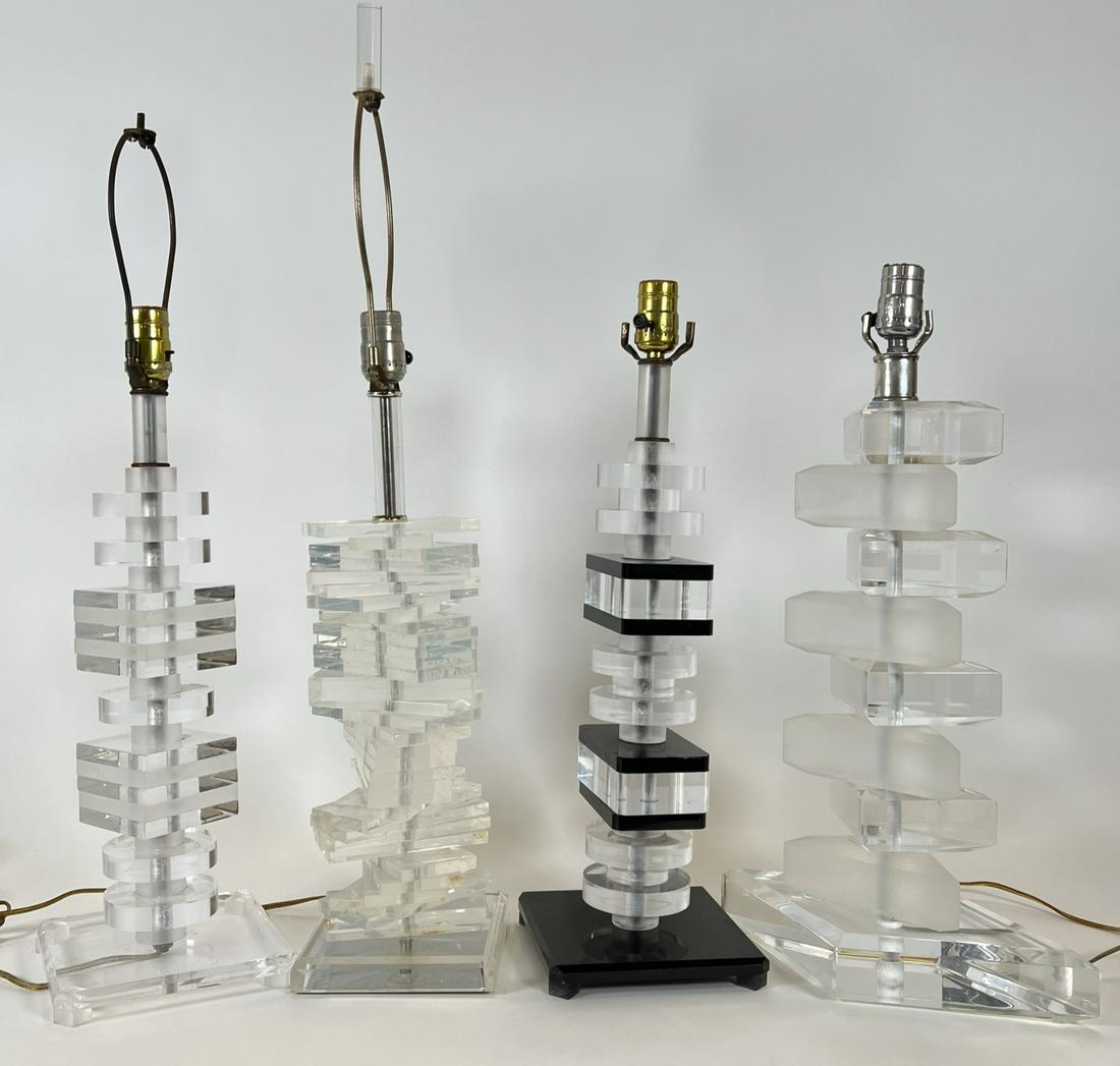 LUCITE TABLE LAMPS: FOUR TABLE LAMPS HAVING STACKED ACRYLIC SEGMENTS IN VARIOUS SHAPES AND SIZES. TALLEST IS 22" BASE TO SOCKET.
