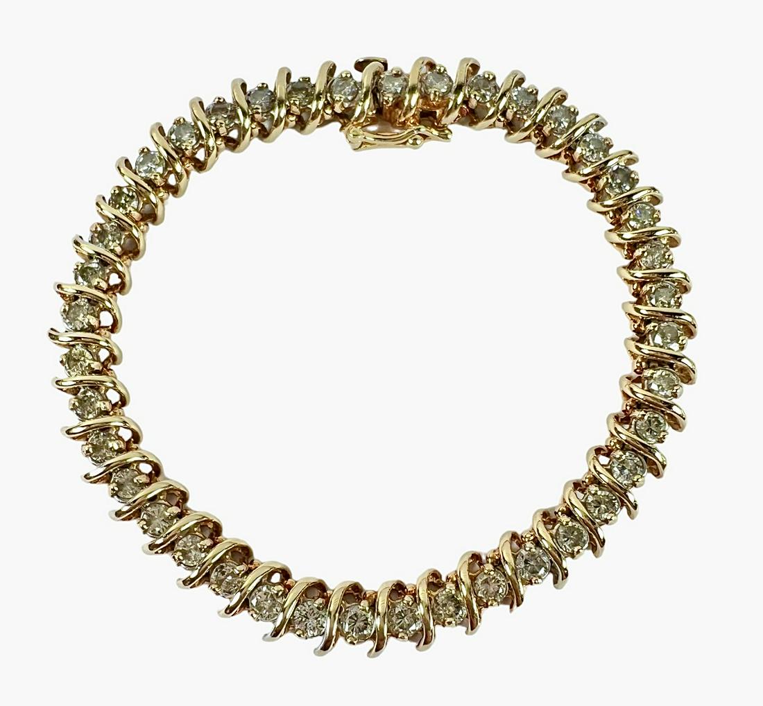 GOLD AND DIAMOND BRACELET: 14K YELLOW GOLD AND DIAMOND BRACELET. APPROX. 4 CT. DIAMONDS, 16.9 GRAMS, APPRAISAL INCLUDED WITH SALE. PLEASE REVIEW APPRAISAL FOR ADDITIONAL DETAILS. ESTIMATED REPLACEMENT VALUE $4,950.