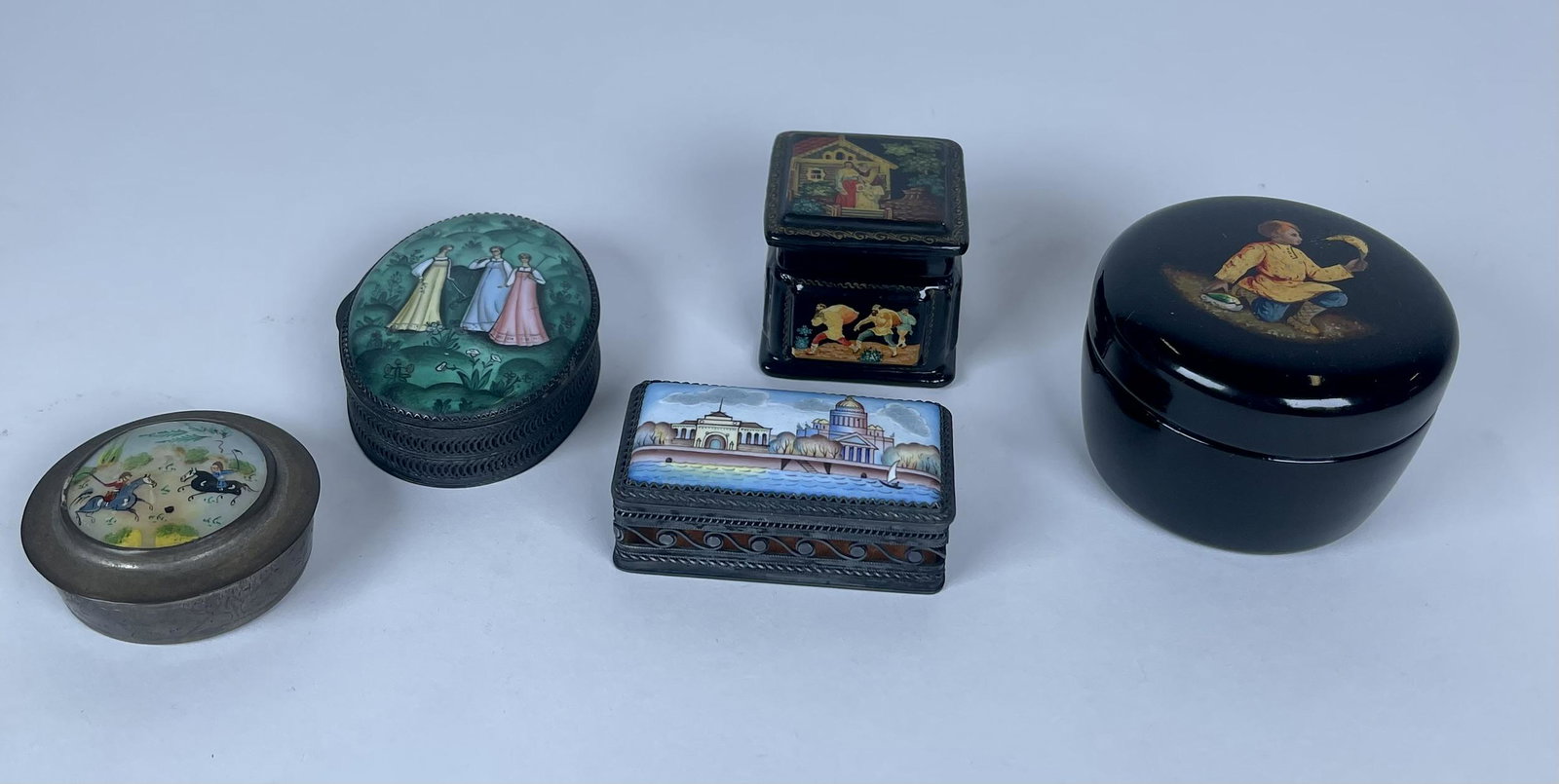 TRAVEL TRINKET BOXES: INCLUDES THREE THAT ARE METAL-HOUSED WITH ENAMEL/PORCELAIN AND A PAIR OF LACQURED BOXES.