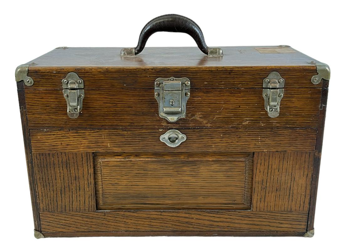 GERSTNER & SON'S MACHINIST TOOL BOX: WITH CONTENTS INCLUDING MICS, GAUGES, BITS, REAMERS, TAPS, DIES AND MORE. FELT LINED INTERIOR WITH MACHINIST'S ORIGINAL PHOTO I.D.