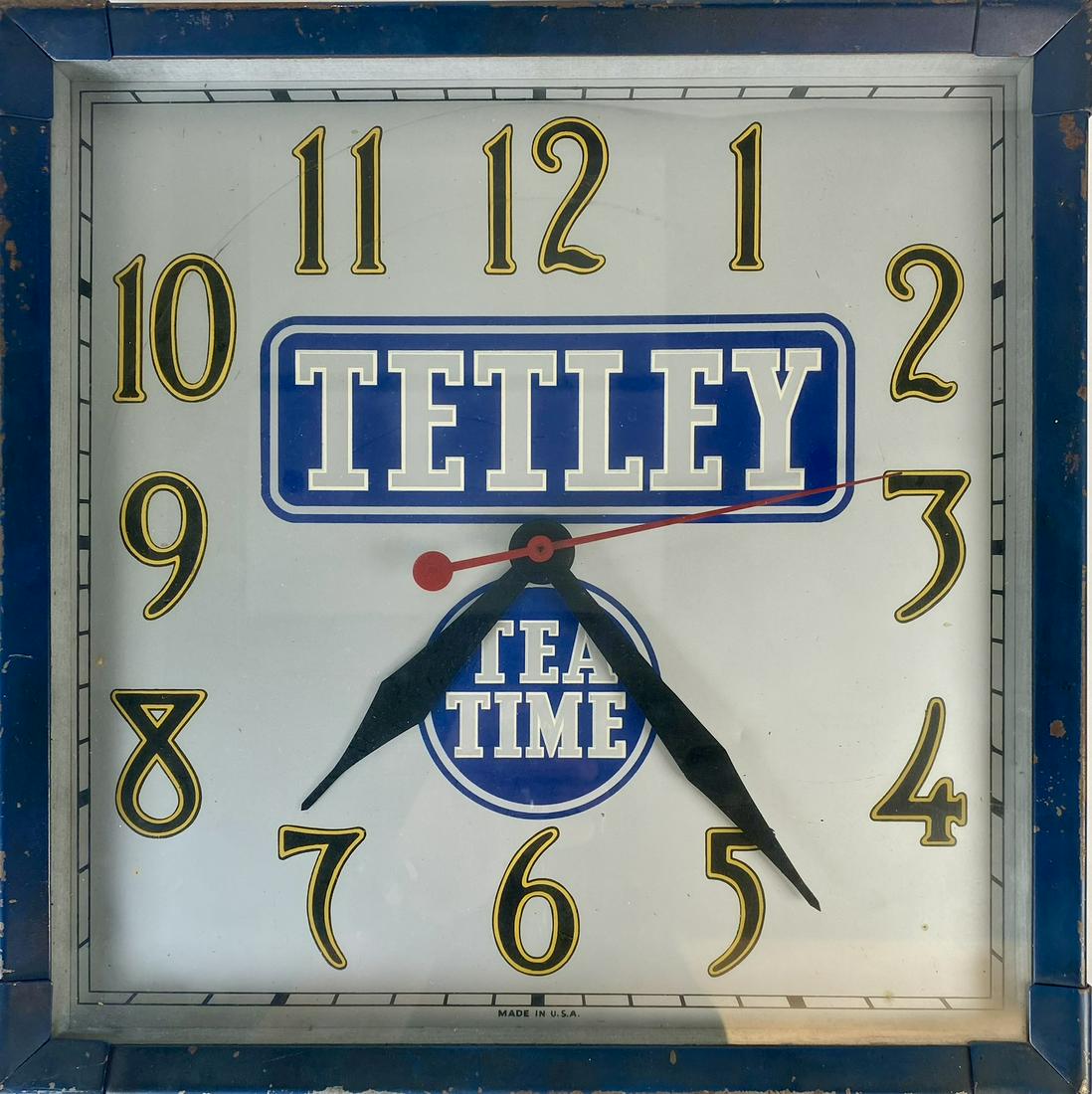 TETLEY TEA TIME ADVERTISING CLOCK: ELECTRIC CLOCK, METAL FRAMED WITH TETLEY TEA TIME ADVERTISING. 14.5"X14.5"