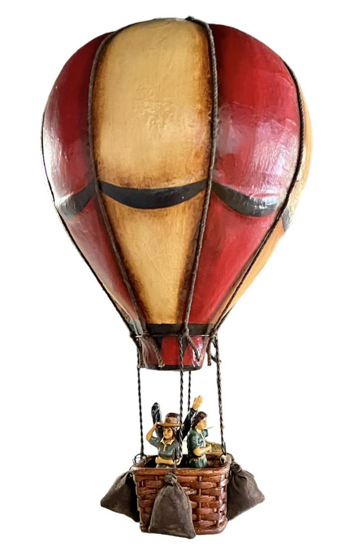 DECORATIVE HOT AIR BALLOON: COMMERCIALLY PRODUCED, PAPER MACHE BALLOON WITH SUSPENDED BASKET OF PASSENGERS. 22"H