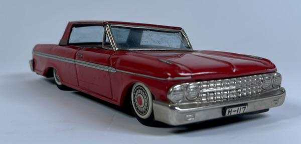 1961 FORD GALAXIE 500 FRICTION TOY: TIN FRICTION TOY IN WORKING ORDER. 9.75"L
