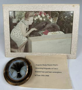 MARIA HOYT - MOURNING KEEPSAKE OF M'TOTO GORILLA: TWO-SIDED MOURNING KEEPSAKE CONTAINING A PHOTOGRAPH OF M'TOTO ON ONE SIDE AND HAVING BRAIDED HAIR AND HAIR CENTERPIECE OF M'TOTO (1931-1968) ON THE REVERSE. INCLUDED IN THE COLLECTION IS A 5"X7"