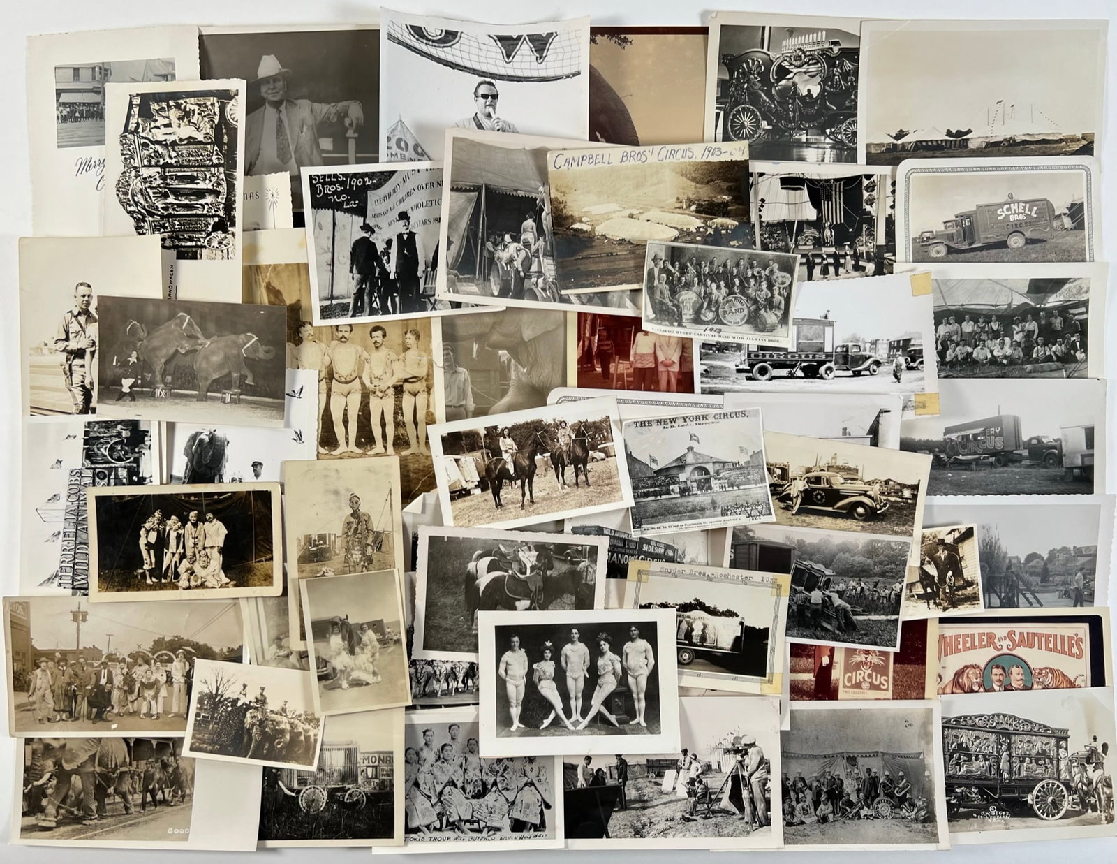 CIRCUS PHOTOGRAPH COLLECTION: GROUPING OF SNAPSHOT UP TO 5"X7" PHOTOGRAPHS. SIDESHOW, PERFORMERS, WAGONS, ANIMALS, PARADES, CLOWNS AND MORE.