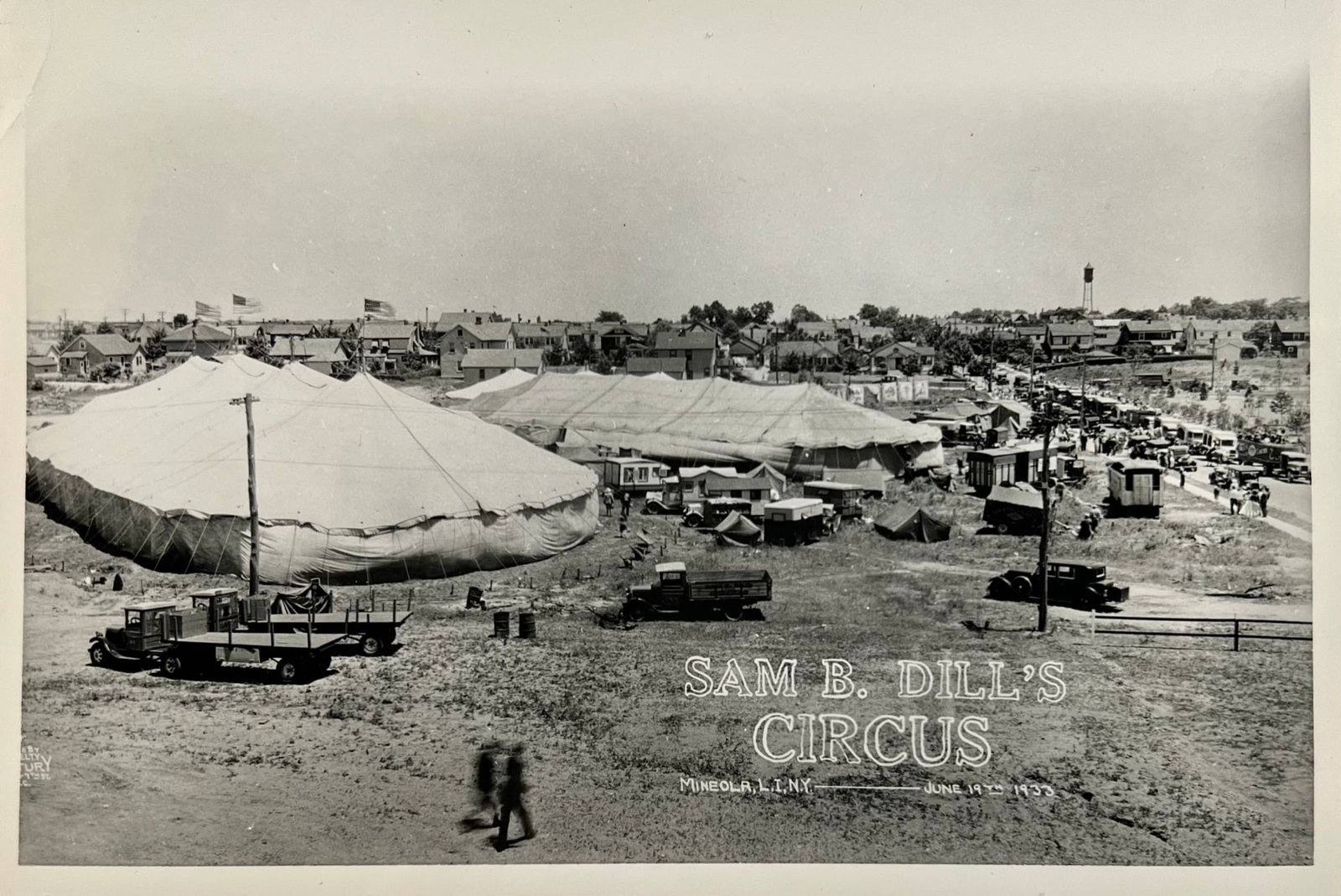 SAM B. DILLS CIRCUS PHOTOGRAPH: PHOTOGRAPH OF THE SAM B. DILL CIRCUS LOT SCENE, JUNE 19TH, 1933. 6.75"X10"
