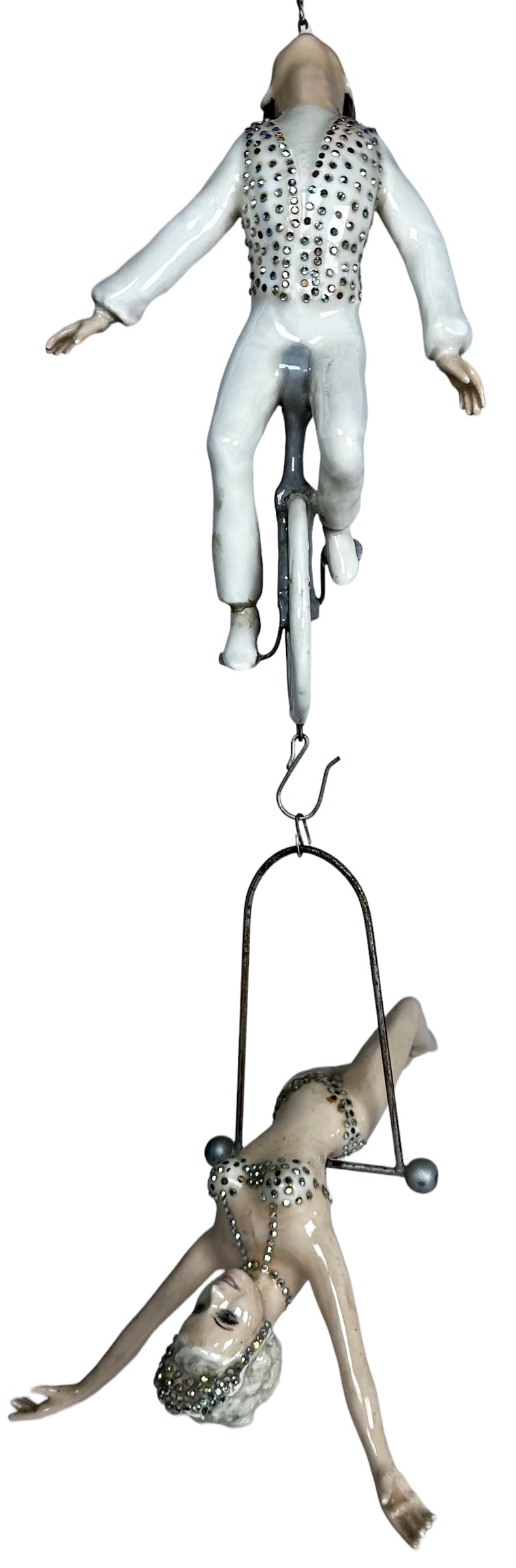LA NORMA IRON JAW TRAPEZE ART SCULPTURE: KATHLEEN NELSON COLLECTION. HAND-PAINTED, CERAMIC ART SCULPTURE. OVERALL WHEN HUNG APPROXIMATELY 15"