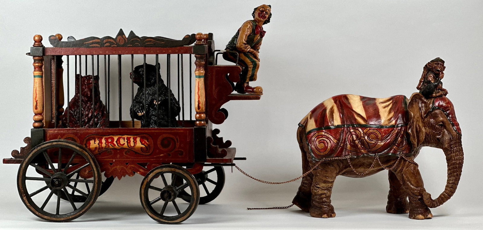 VINTAGE CIRCUS WAGON DISPLAY: LARGE CIRCUS WAGON DISPLAY WITH ELEPHANT TOWING A WAGON WITH CLOWN AND ANIMALS. INCLUDES A FLOATING SHELF DISPLAY. OVERALL 36"