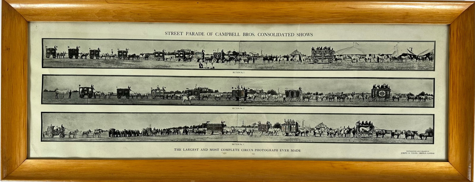 PANORAMIC PRINT - STREET PARADE - CAMPBELL BROS. SHOWS: PANORAMIC PRINT OF THE LARGEST AND MOST COMPLETE CIRCUS PHOTOGRAPH EVER MADE, JOSEPH H. YOUNG, OBERLIN, KANSAS. FRAMED, OVERALL 17"X46"