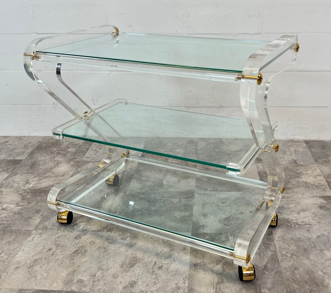 After Charles Hollis Jones Zig-Zag Bar Cart: Clear acrlylic Zig-Zag ends with glass shelves. 20"x32" top, 30"h
