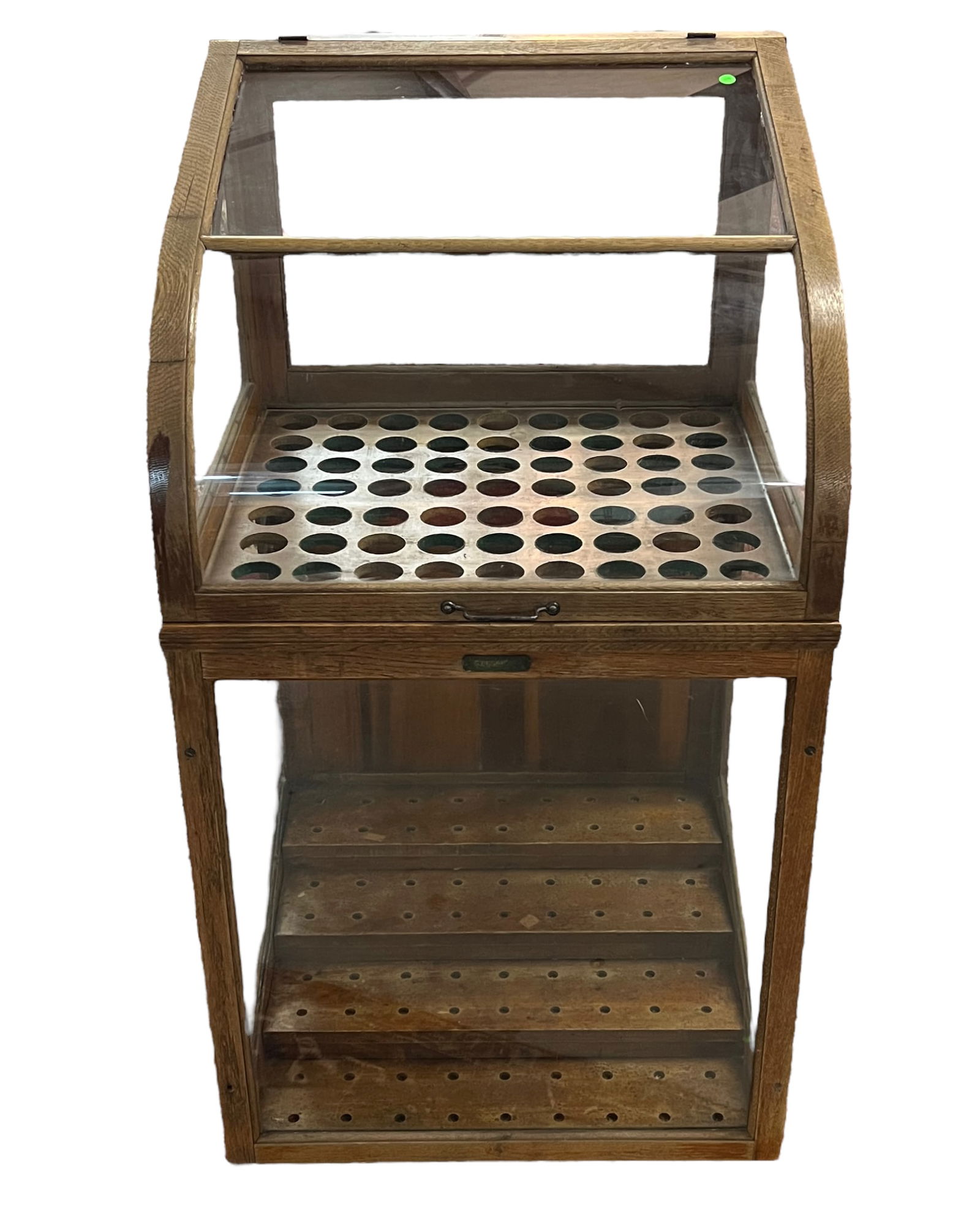 ANTIQUE MERCANTILE CANE DISPLAY CABINET: H. PAUK & SONS MANUFACTURING CANE DISPLAY CABINET, OAK WITH CURVED FRONT GLASS. 53"H, 27"W, 25"D.