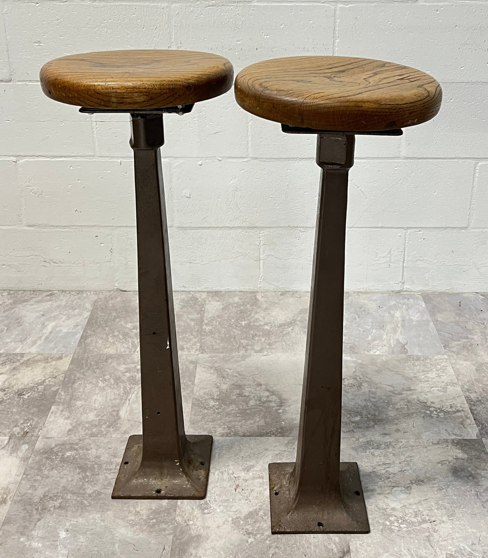 PAIR - SODA FOUNTAIN STOOLS: PAIR OF SWIVEL BAR STOOLS, IRON BASE WITH OAK SEAT. 32"H