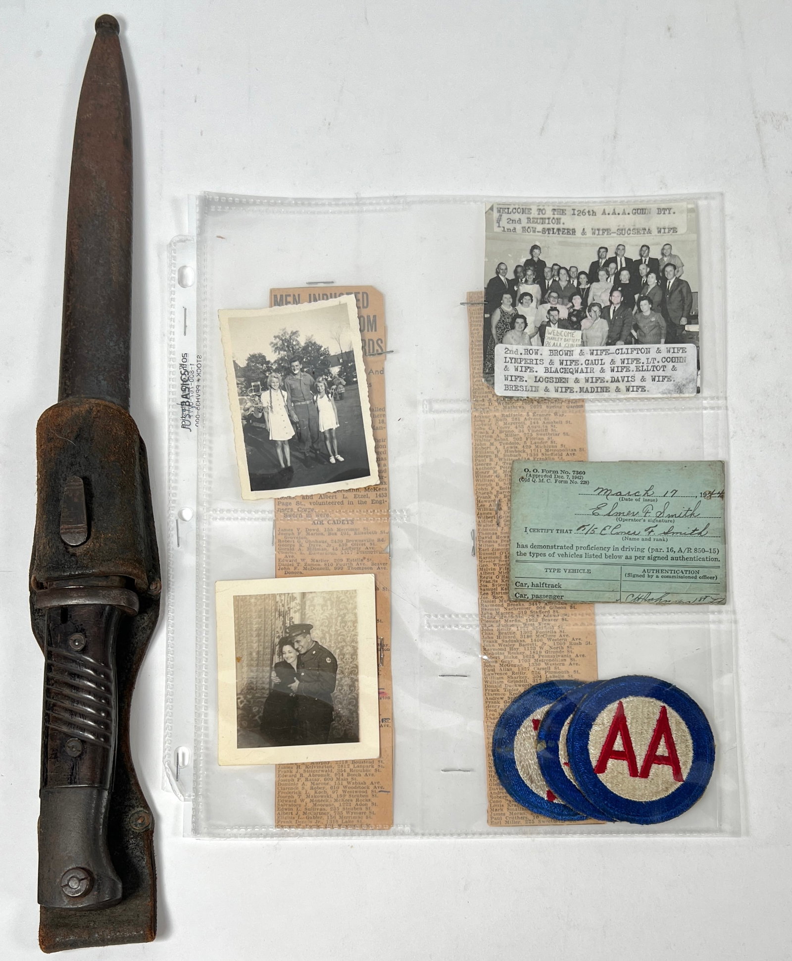 WWII GERMAN MILITARY U.S. SOLDIER ITEMS: COLLECTION OF GERMAN MILITARY ITEMS INCLUDING NAZI BAYONET AND SS MARKED FROG. MISMATCHED NUMBERS, BLADE DATED TO 1941. FROG IS WORN BUT CLEARLY MARKED ON BACK WITH SS RUNES AND RZM CODE. INCLUDES UNI