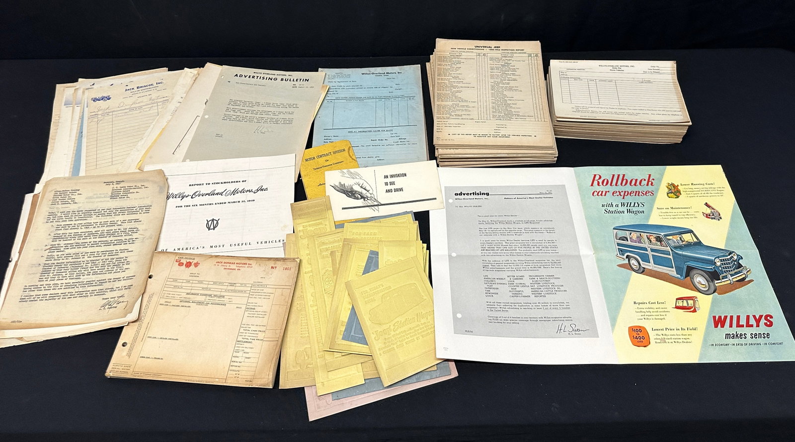 WILLYS OVERLAND JEEP DEALER COLLECTION: A COLLECTION OF DEALER ITEMS INCLUDING: LIFE MAGAZINE PROOF AD, PRINTER PLATES, INVITATION TO DRIVE, AUTO FINANCING, REPORT TO STOCK HOLDERS, CACHE OF DEALER LETTERS, CAR INVOICES, ORDER SHEETS, PARTS