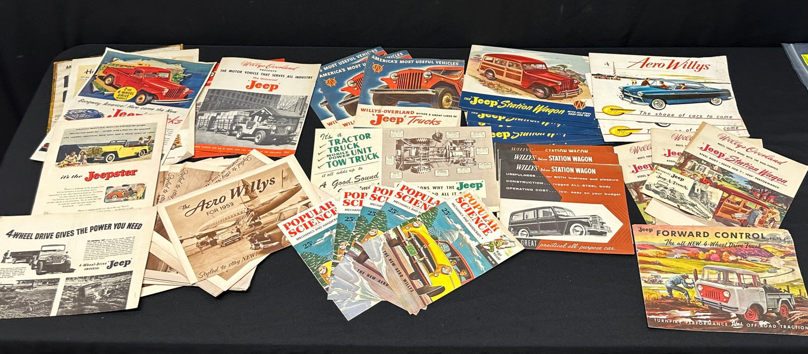 WILLYS OVERLAND JEEP ADVERTISING: COLLECTION OF VARIOUS AUTO ADVERTISING, 1940'S-1950'S.
