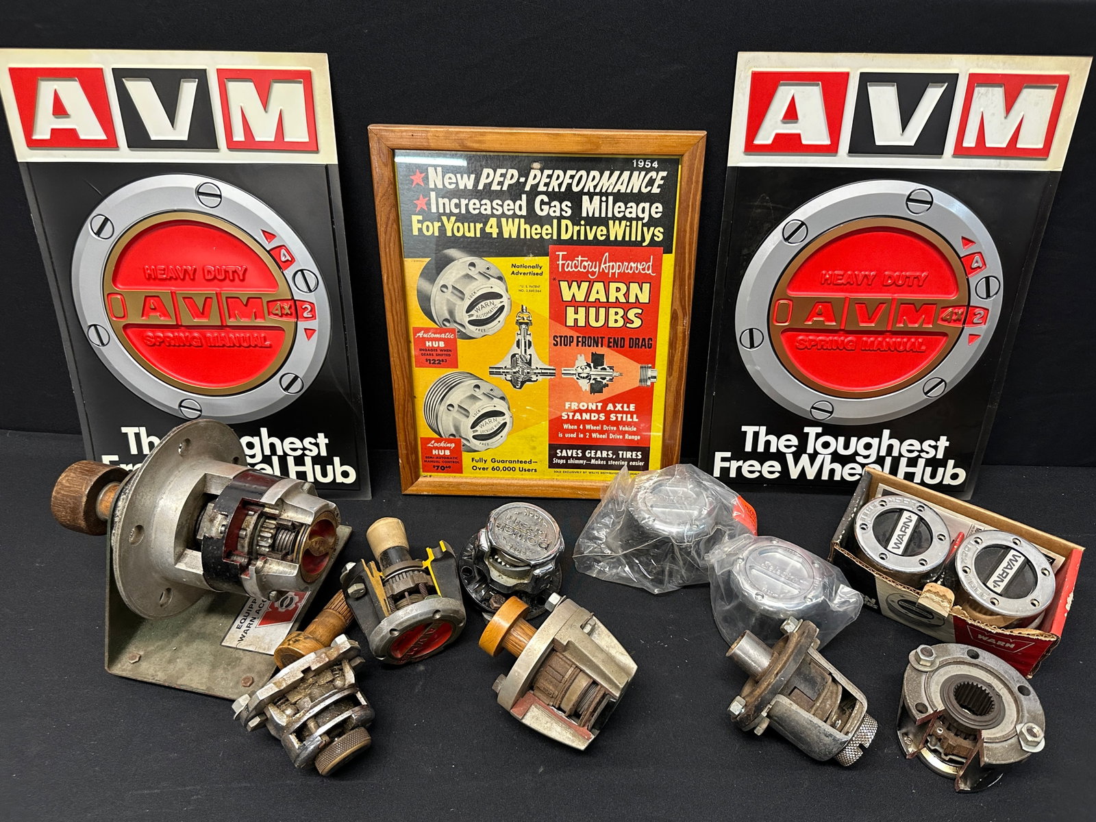 JEEP 4WD LOCKING HUB CUTAWAYS, DISPLAY: WARN AND OTHER LOCKING HUBS, CUT-AWAY COUNTER DISPLAYS, AVM AND WARN ADVERTISING.