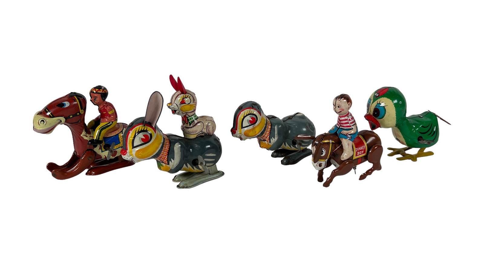 COLLECTION OF TIN WIND UP TOYS: WORKING. ONE BUNNY MISSING RIDER.