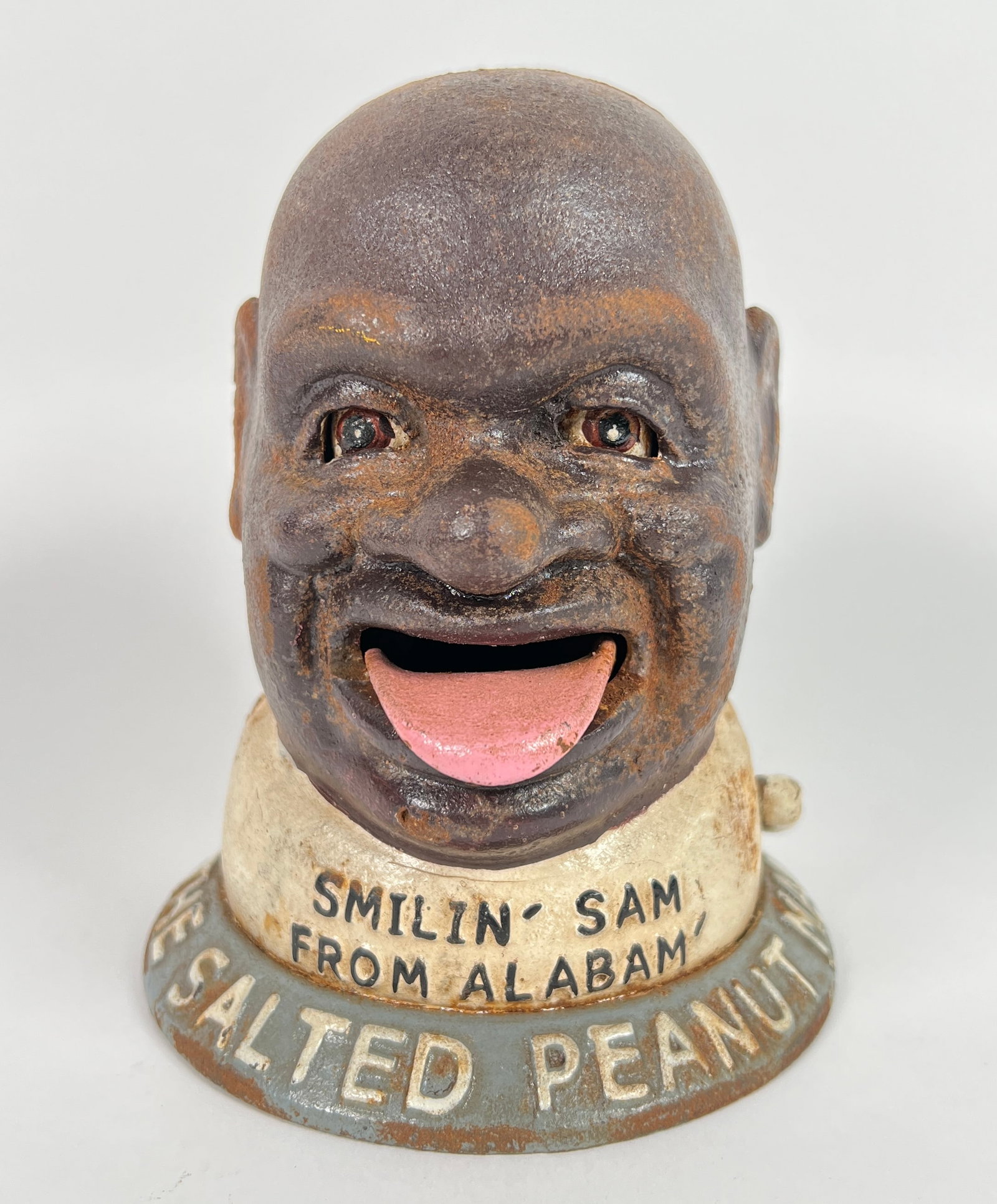 SMILIN SAM FROM ALABAM BANK: RESTRIKE CAST IRON COIN BANK. 6"H