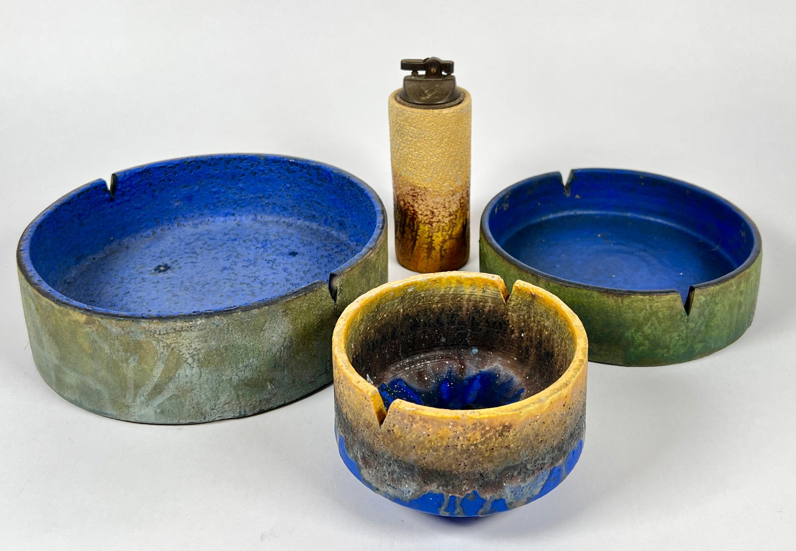 MARCELLO FANTONI FOR RAYMOR: MARCELLO RANTONI FOR RAYMOR POTTERY GROUPING, INCLUDES THREE BOWLS AND LIGHTER. LARGEST BOWL WITH RIM CHIP, LARGEST IS 8.75"