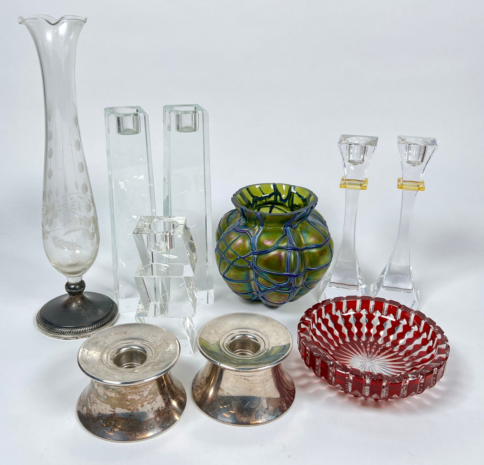 MODERN DECORATIVE OBJECTS: RUBY CUT-TO-CLEAR DISH, GORHAM STERLING SILVER WEIGHTED CANDLE STANDS, THREADED IRIDESCENT ART GLASS VASE (RIM CHIP), OLEG CASSINI CANDLE STANDS, NACHTMANN, STERLING SILVER WEIGHTED VASE