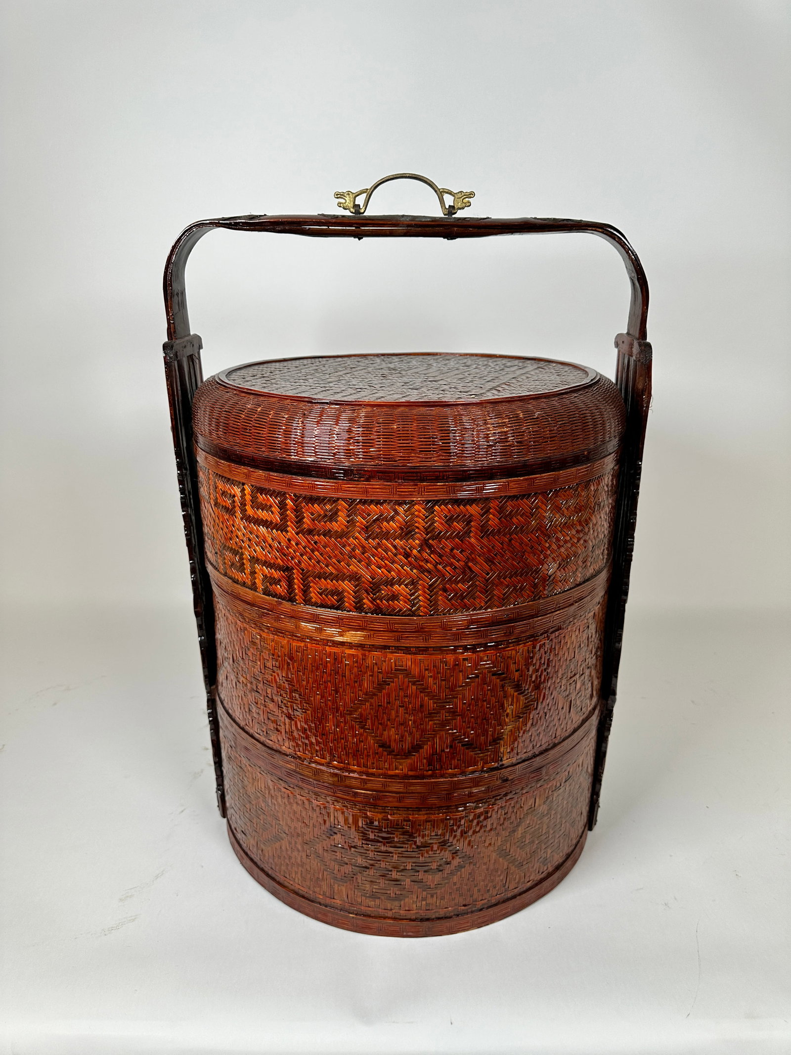 NESTED CHINESE WEDDING BASKET: BRASS FITTED RATTAN, THREE LEVEL. 25"H