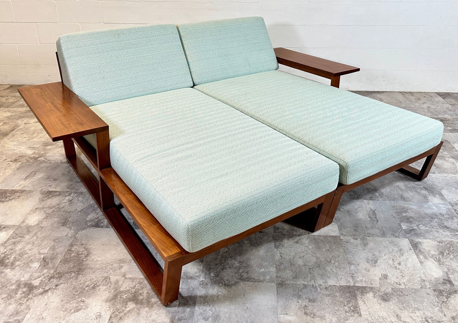 POINT TEAK PATIO LOUNGER: IN TWO-PARTS, WITH SIDE COCKTAIL SHELF, NON-ADJUSTING, SUNBRELLA-TYPE INDOOR/OUTDOOR FABRIC. CAN BE SET UP INDEPENDENT OR IN TANDEM. ALTOGETHER 64"L, 80"W.