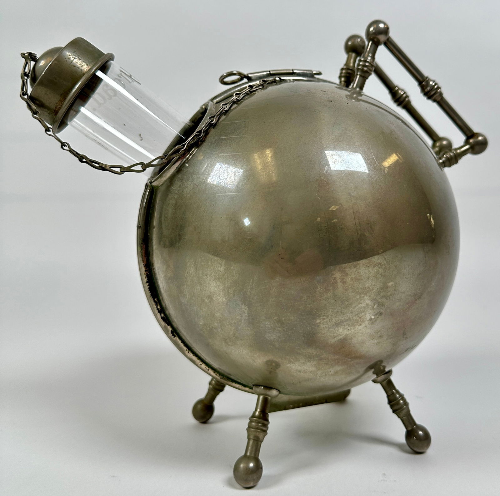 AFTER CHRISTOPHER DRESSER DECANTER: SILVERPLATE AND GLASS BALL DECANTER.