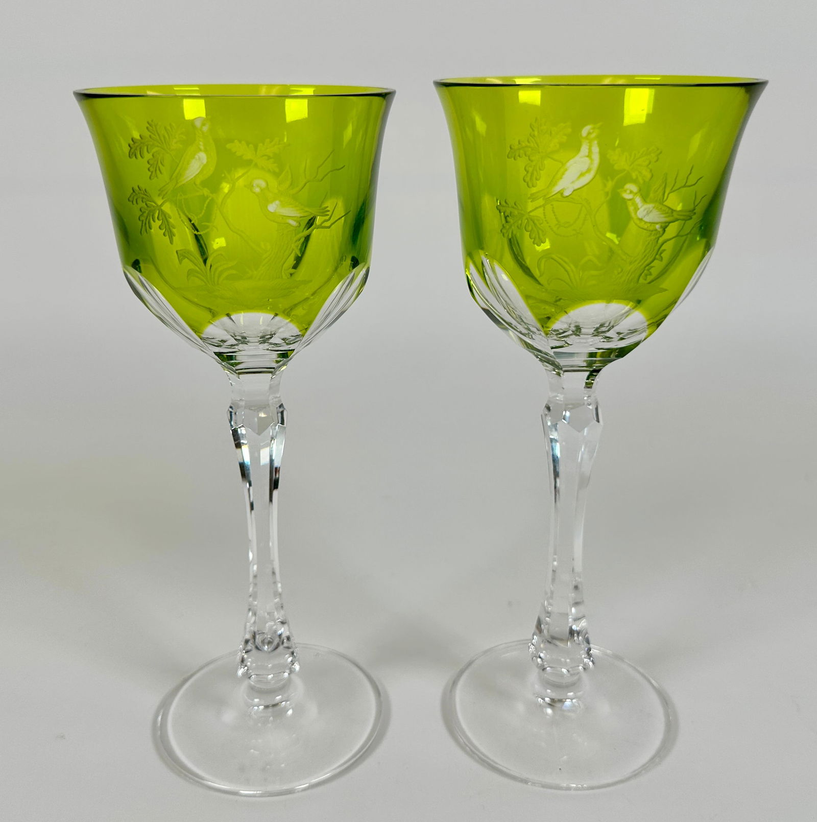 VARGA CUT GLASS WINE GOBLETS: VARGA YELLOW/GREEN TO CLEAR CUT GLASS WINE STEMWARE, ETCHED BIRD DESIGNS. 8.25"