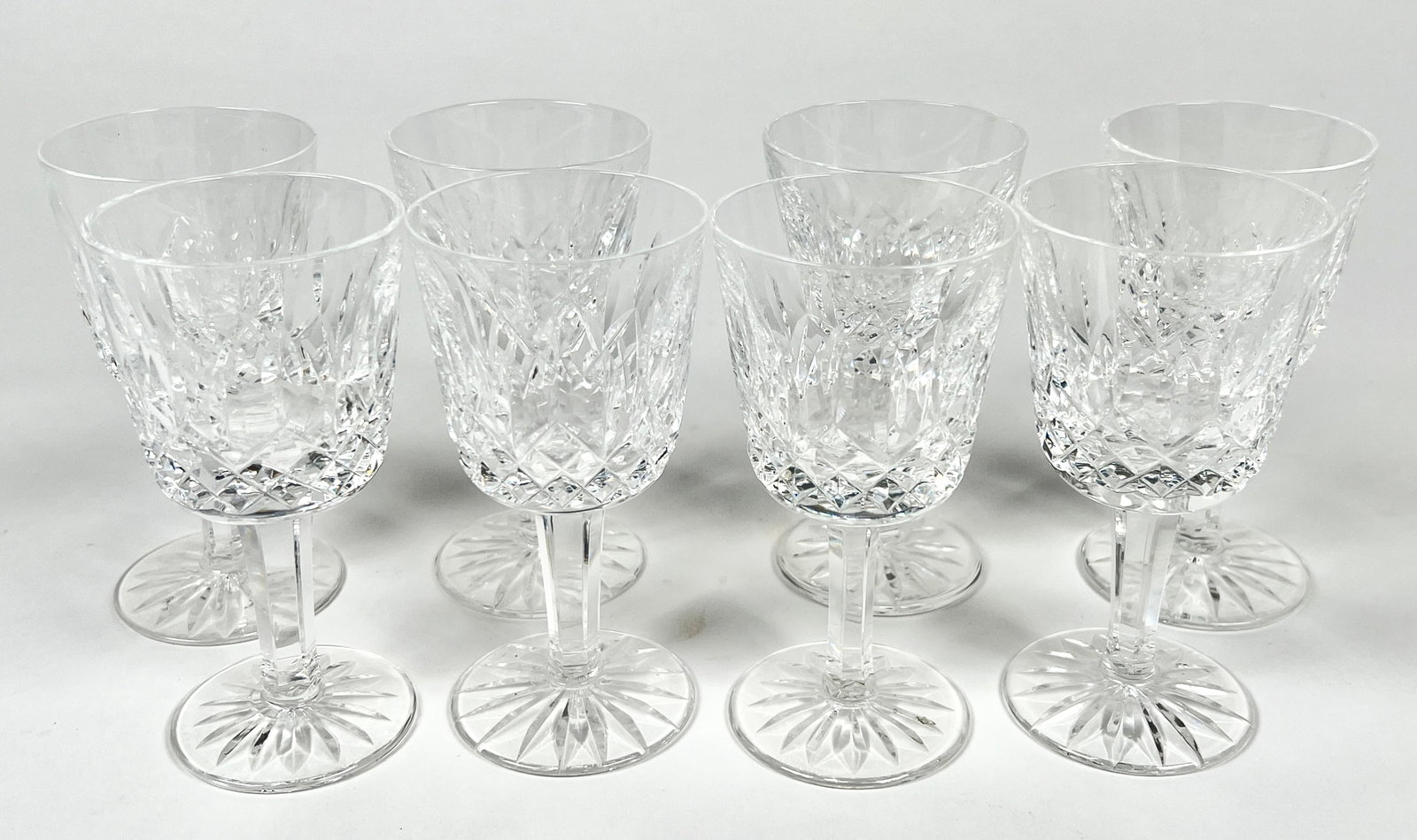 WATERFORD CRYSTAL LISMORE: 8 CLARET WINE GLASSES. 6"H