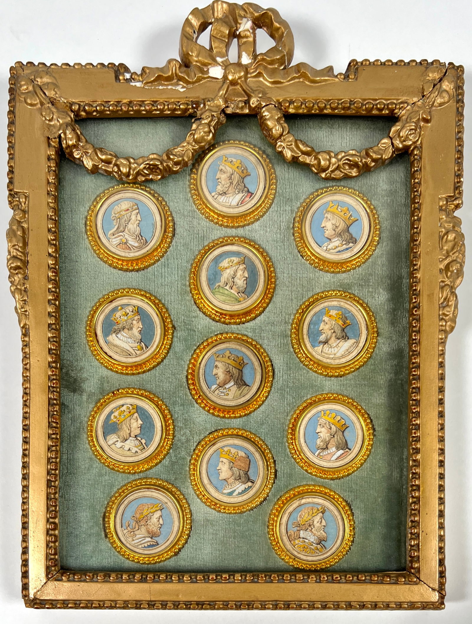 12 KINGS OF FRANCE: ANTIQUE FRAMED COLLAGE, THE 12 KINGS OF FRANCE, FROM 436 TO 1610. 12 DIMINUTIVE GOUACHE FLUME DRAWINGS. MINOR AREAS OF LOSS TO FRAME. 8"X11"