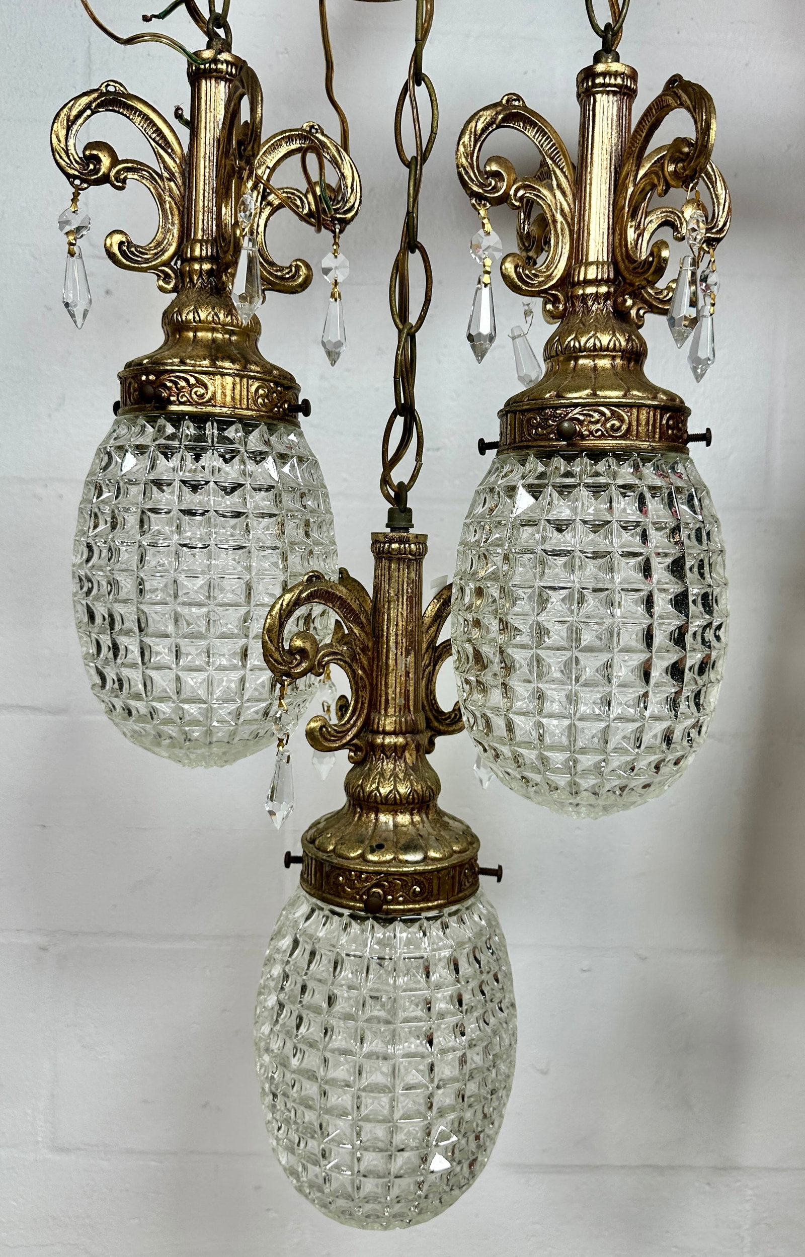 GERINGER PENDANT LAMPS: TRIO OF BRASS MOUNTED PINEAPPLE CRYSTAL PENDANT LAMPS BY GERINGER. 14"