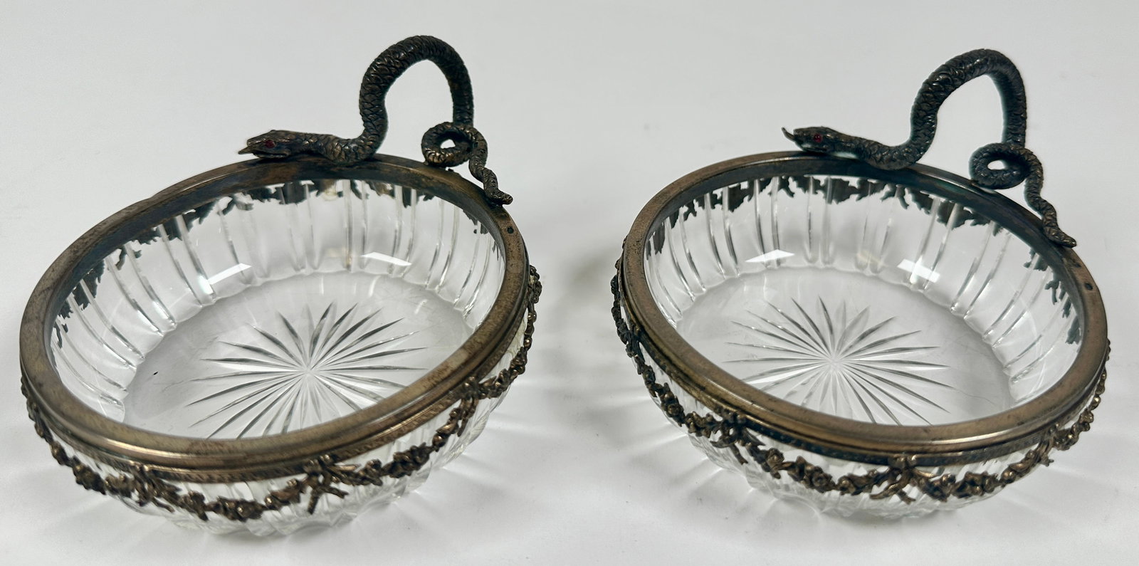 ORMOLU SERPENT DISHES: BRASS FITTED WITH SERPENT AND FLORAL DESIGNS, CUT GLASS DISHES. 4"DIA.