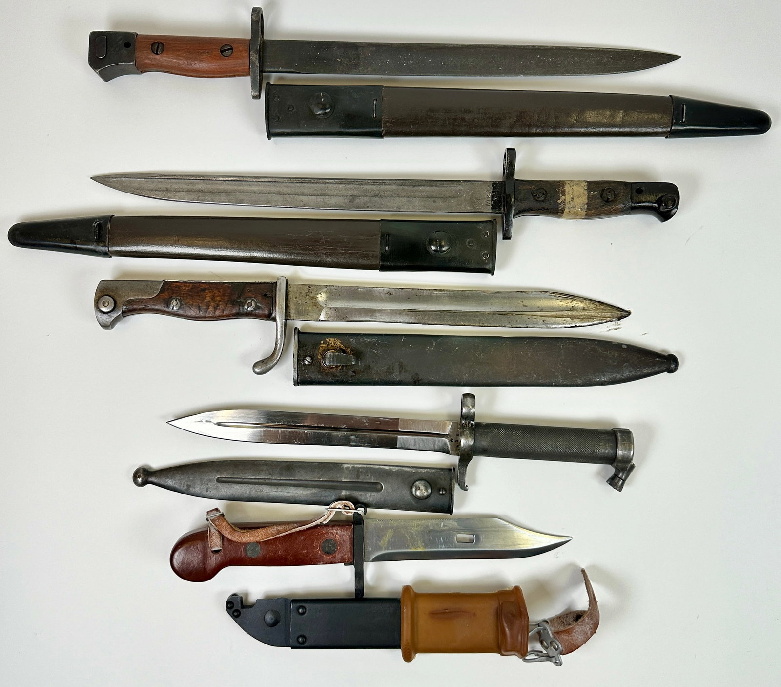 COLLECTION OF MILITARY BAYONETS: MK-I, MK-11, GERMAN MAUSER, AUSTRIAN, SWEDISH M1896