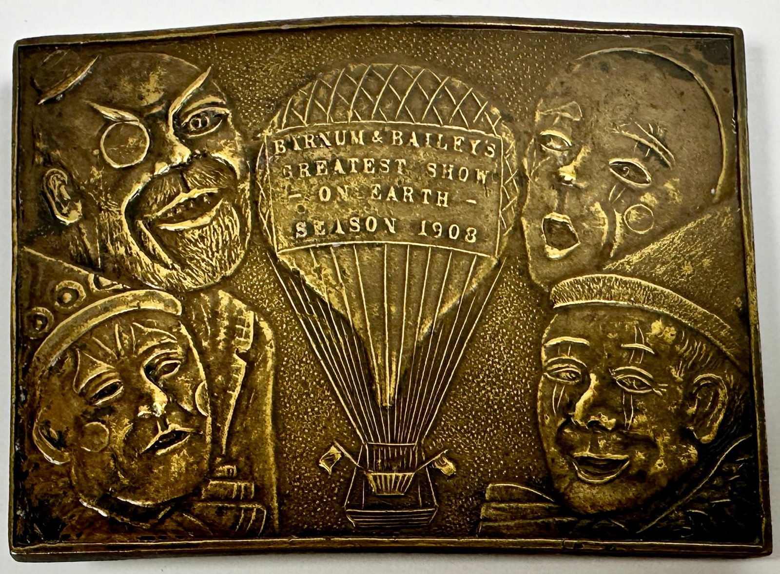 BARNUM & BAILEY CIRCUS BELT BUCKLE: BARNUM & BAILEY CIRCUS - GREATEST SHOW ON EARTH - SEASON 1908 BRASS BELT BUCKLE. NAPOLEAN HALLMARK ON VERSO. 2.75"X3.5"