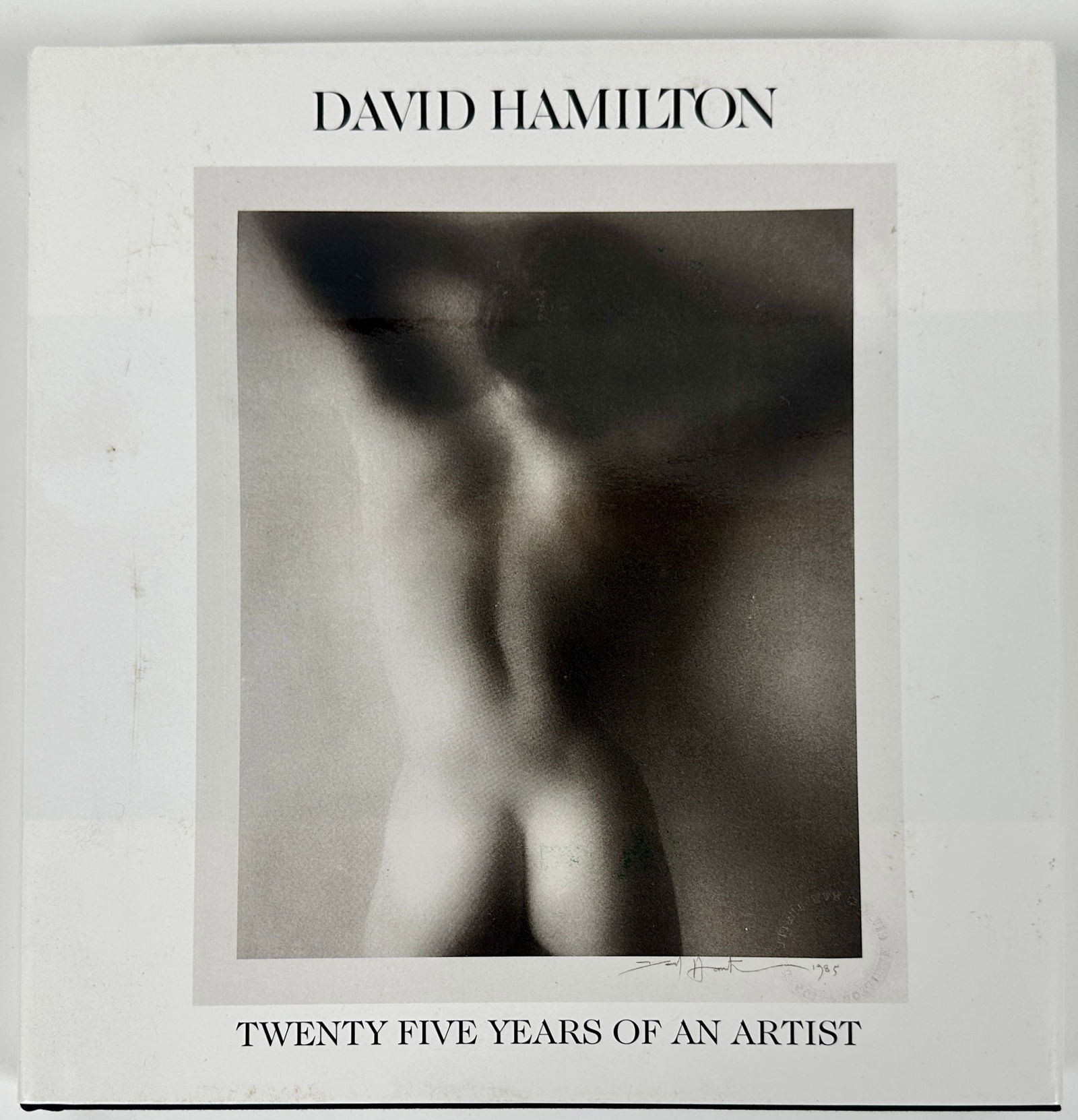 DAVID HAMILTON - TWENTY FIVE YEARS OF AN ARTIST: HARDCOVER WITH JACKET, 315 PAGES COVERING THE ARTIST'S PHOTOGRAPHIC WORK.