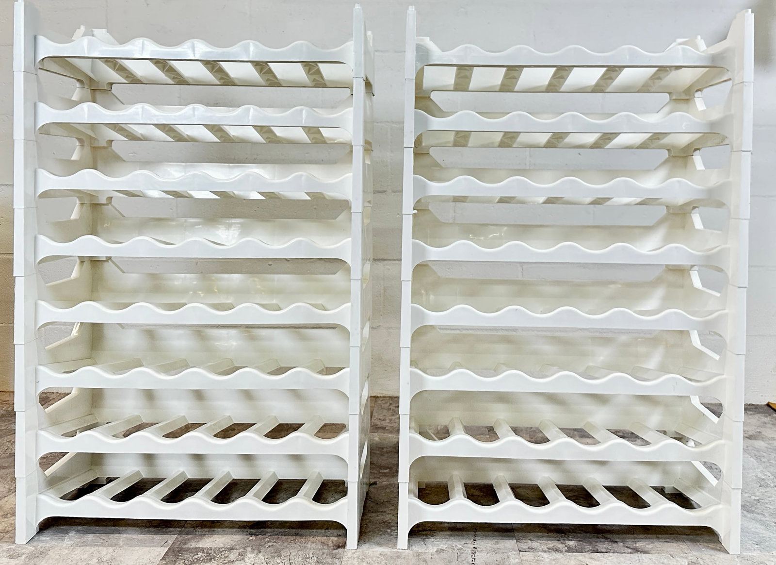 ITALIAN MODULAR WINE STATION: 16 SECTIONS, MULTIPLE CONFIGURATIONS, MARKED ITALY, VINTAGE 1970'S. FROM THE ORIGINAL CRATE AND BARREL. EACH SECTION 23.5"W, 5"H, 12"D. WHEN ALL ARE STACKED 74.25"H