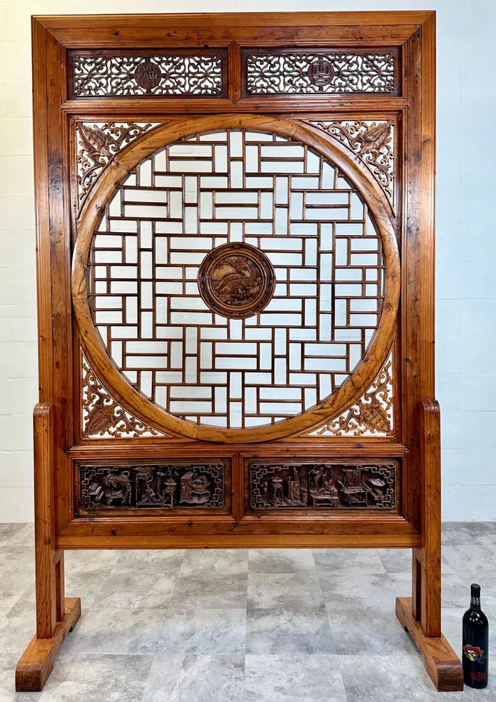 ANTIQUE CHINESE CARVED WINDOW: LARGE ANTIQUE CHINESE CARVED WINDOW, DONGYANG AREA OF THE ZHEJIANG PROVINCE. RESTORED BY CHINA ANTIQUE COMPANY - HARVEY WEST AND XIAOBO YAO, C.1997. FREE-STANDING ON TWO SUPPORTING LEGS OR WALL-HANGIN