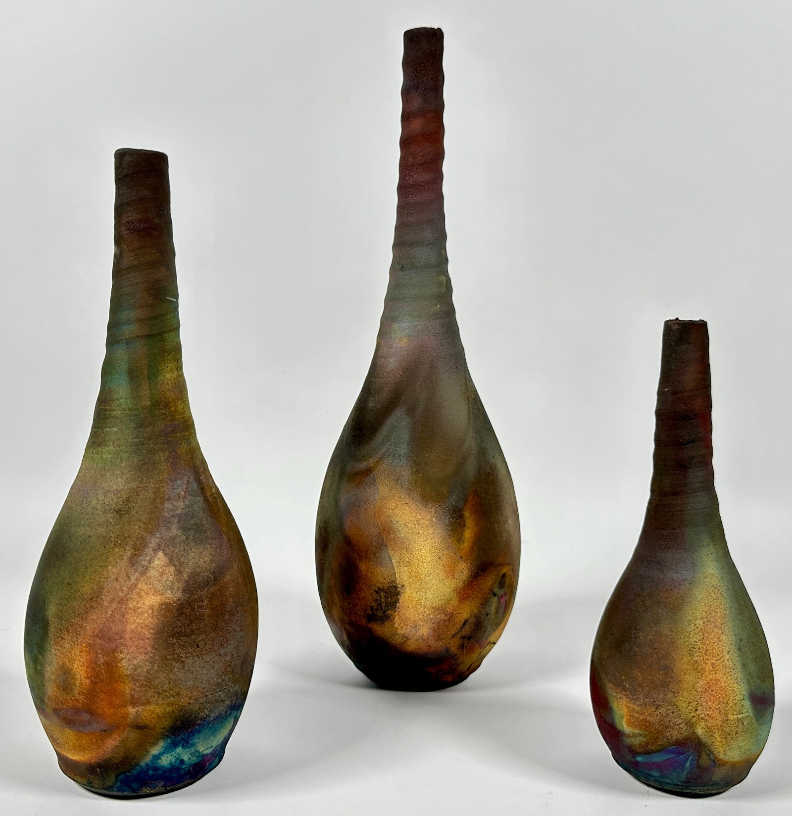 RAKU POTTERY GRADUATED URNS - JINSONG KIM: SIGNED. TALLEST 13"