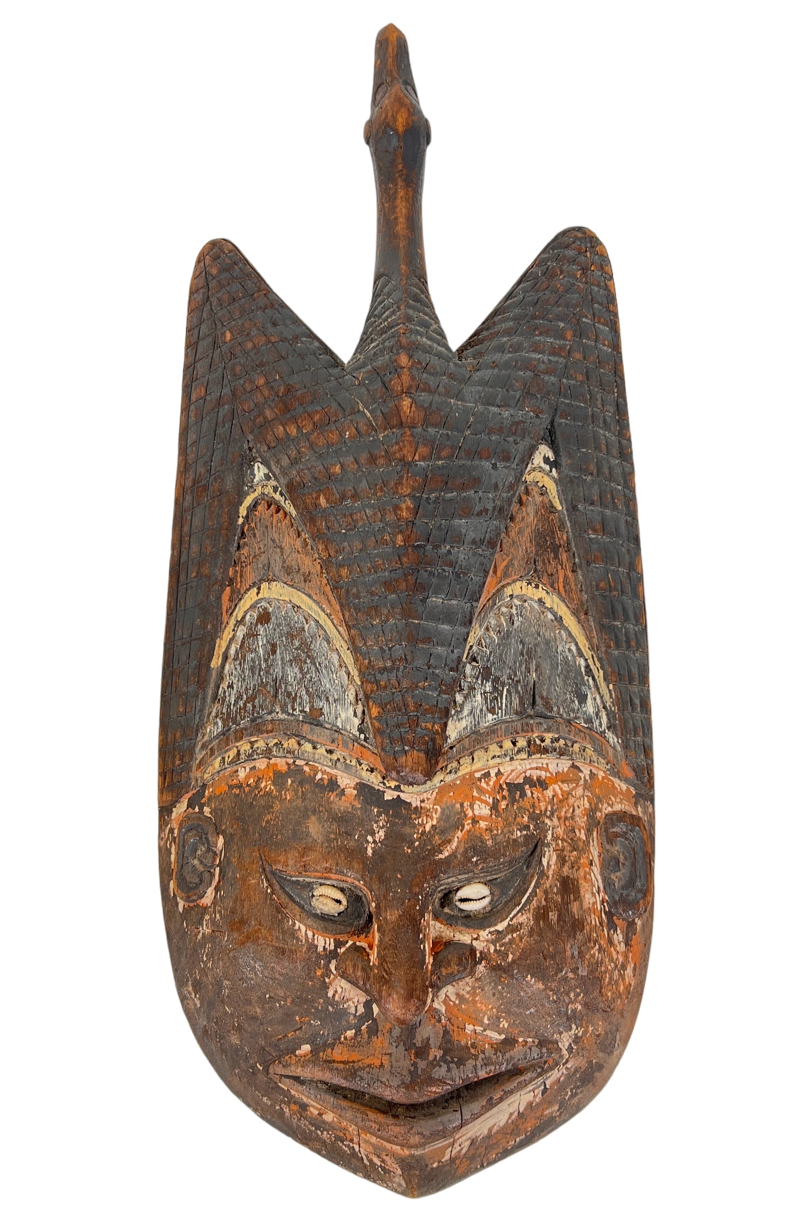 SHAMAN CARVED MASK: PLAQUE WITH CARVED FACE OF COMMORAN T-BIRD. SEPIK RIVER, PAPUA, NEW GUINEA.