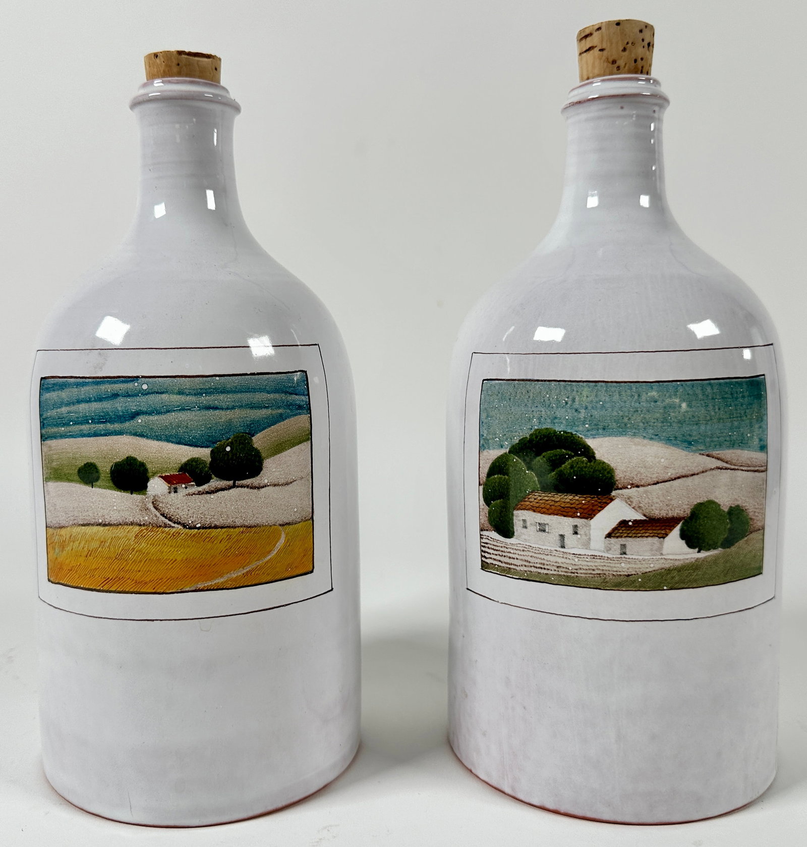 PAIR APOTHECARY BOTTLES - CLAUDE & SLAVIK PALLEY: PAIR OF FRENCH FAIENCE BOTTLES. 10"