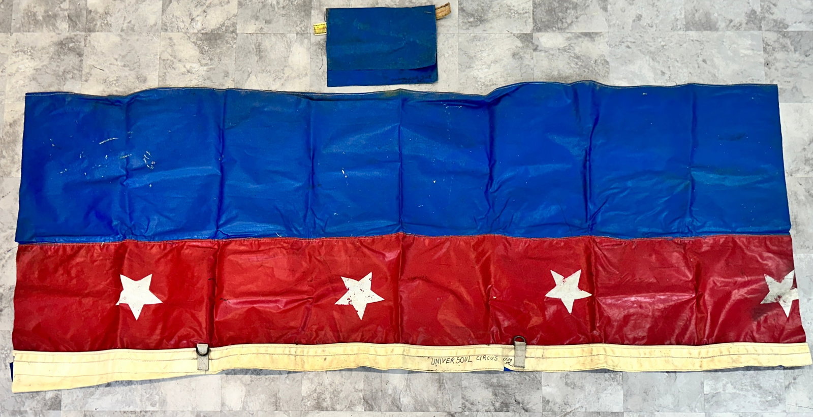 UNIVERSOUL CIRCUS CANVAS FRAGMENT: UNIVERSOUL CIRCUS, C.2000. A SECTION OF CANVAS MEASURING 4'X10'. ROBERT F. HOUSTON COLLECTION.