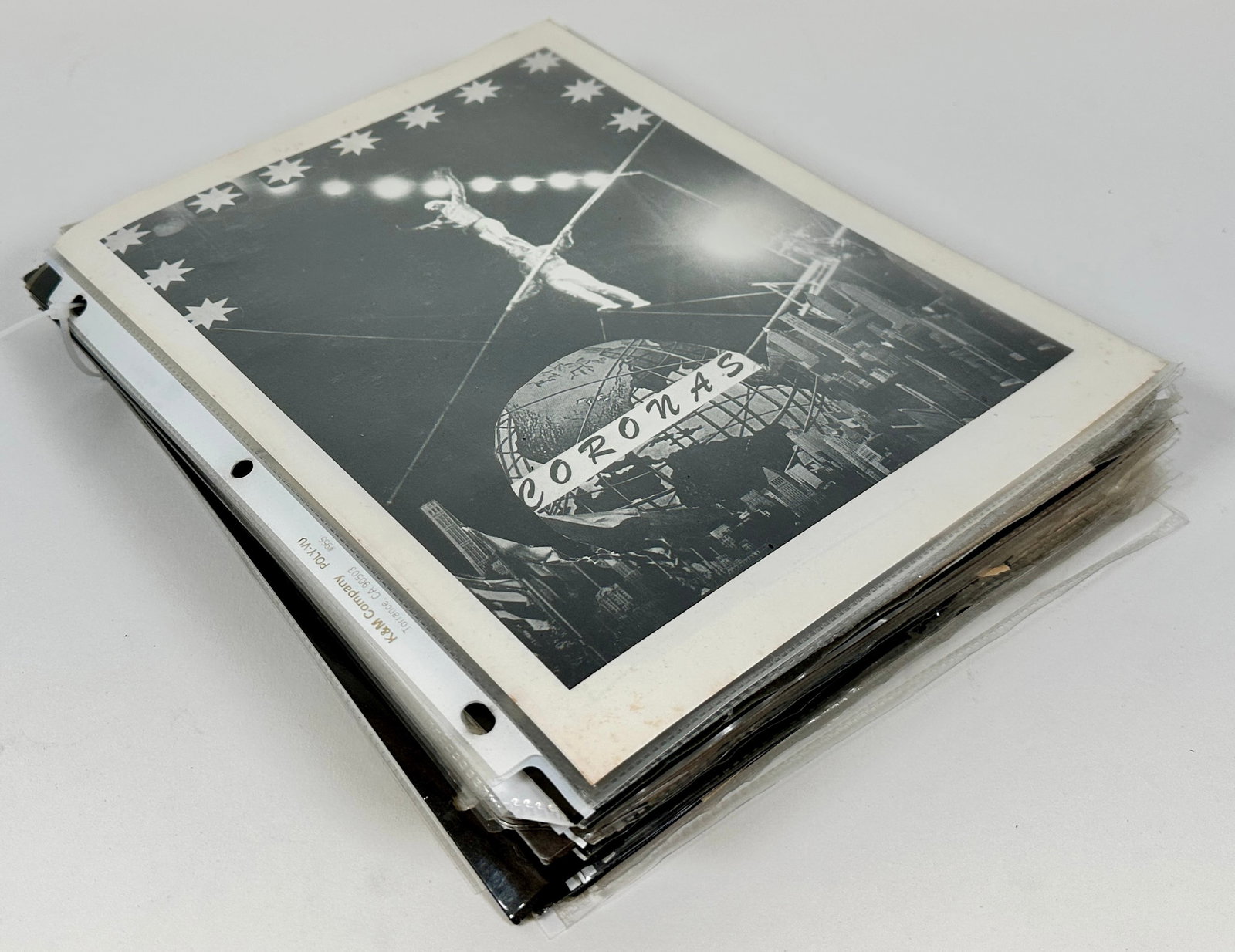 CIRCUS WIRE ACT PHOTOGRAPH COLLECTION: ALL SORTS OF WIRE ACTS, HIGH WIRE, SLACK AND OTHERS. APPROXIMATELY 50 PAGES.