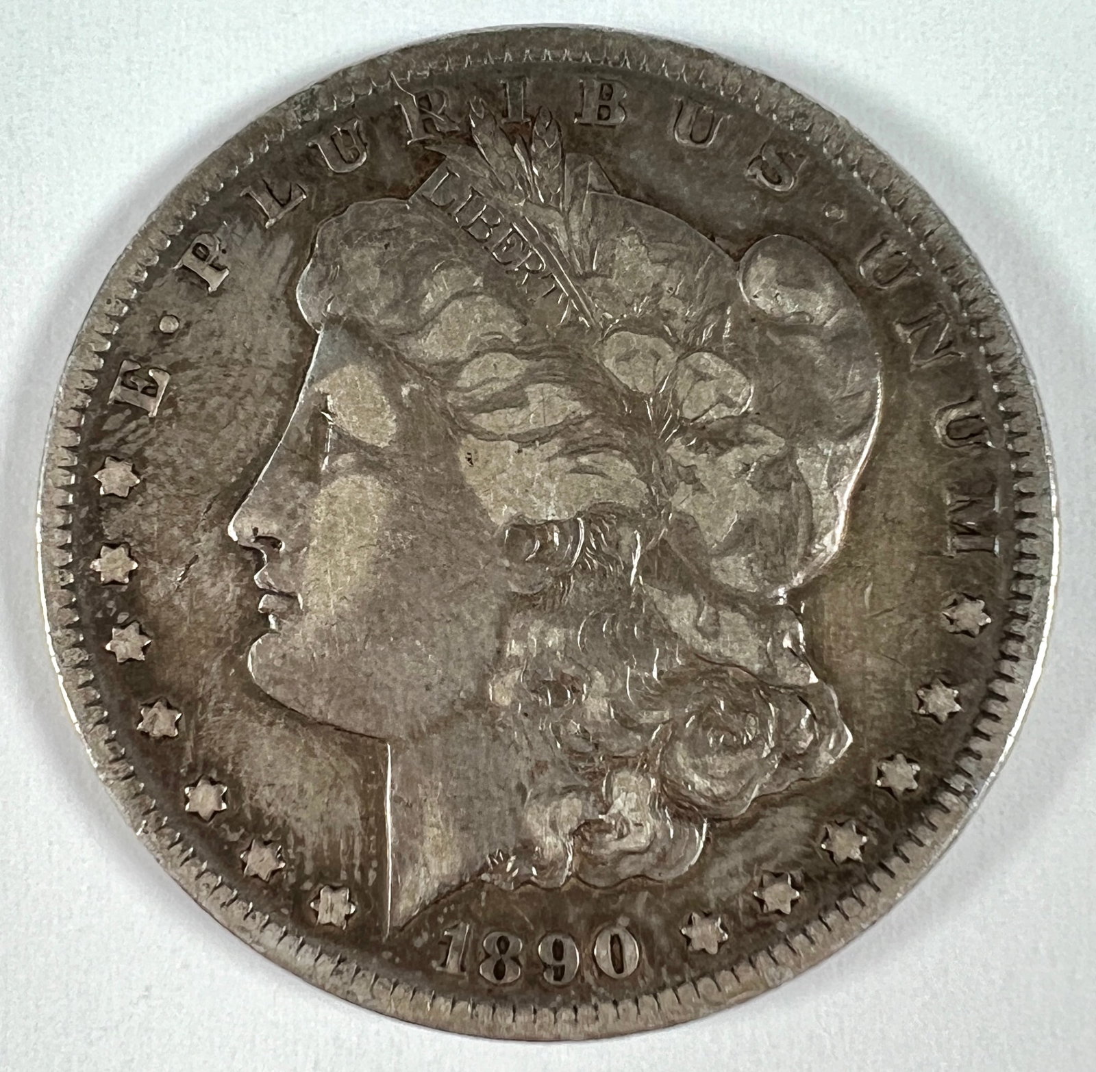 1890-CC MORGAN SILVER DOLLAR: CIRCULATED