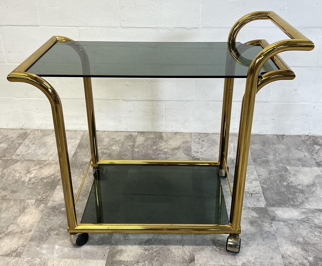 VINTAGE MID-MOD BAR CART: SMOKED GLASS PANELS WITH BRASS STRUCTURE. 34"X17"X30"