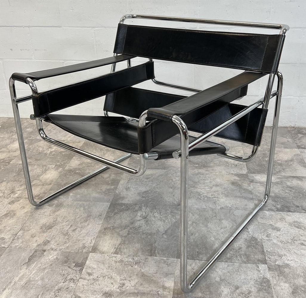 AFTER KNOLL WASSILY SLING CHAIR: CHROME WITH BLACK LEATHER SLINGS, PUSH END CAPS.