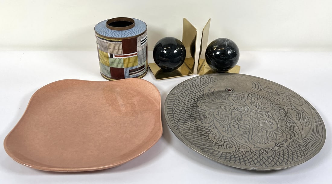 DECORATIVE AND SERVING ITEMS: ARTHUR COURT ALUMINUM CHARGER, FABIENNE JOVIN CLOISONNE JAR, MARBLE BALL BOOKENTS, RUSSEL WRIGHT PLATE.