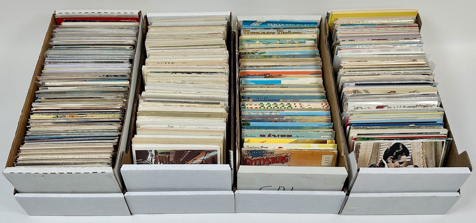 ESTATE SOUVENIR POSTCARD COLLECTION: APPROXIMATELY 2000 POSTCARDS, SOME USED, MID-20TH CENTURY.