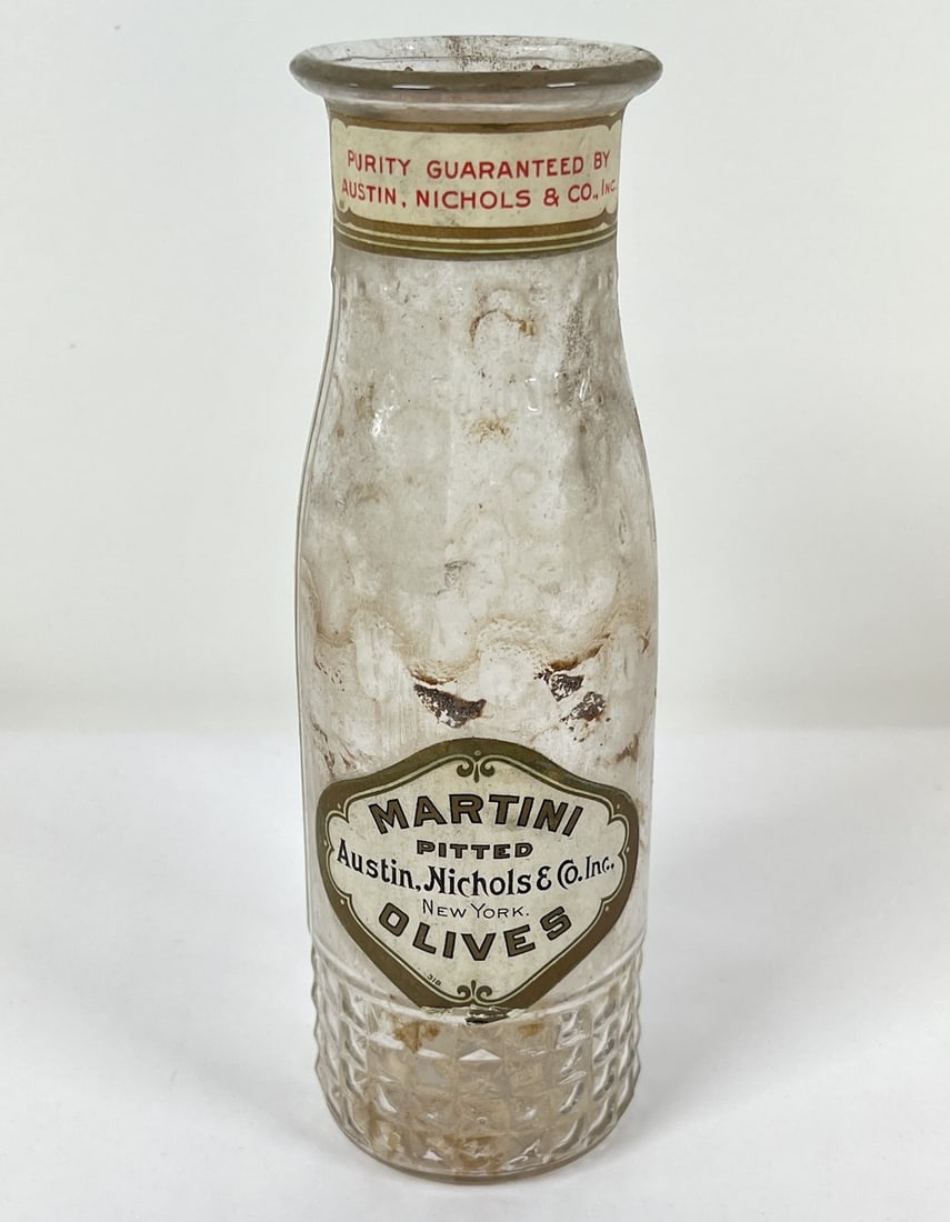 ANTIQUE MARTINI PITTED OLIVES BOTTLE: AUSTIN, NICHOLS & CO., NEW YORK. CORK IS IN THE BOTTOM OF THE BOTTLE.