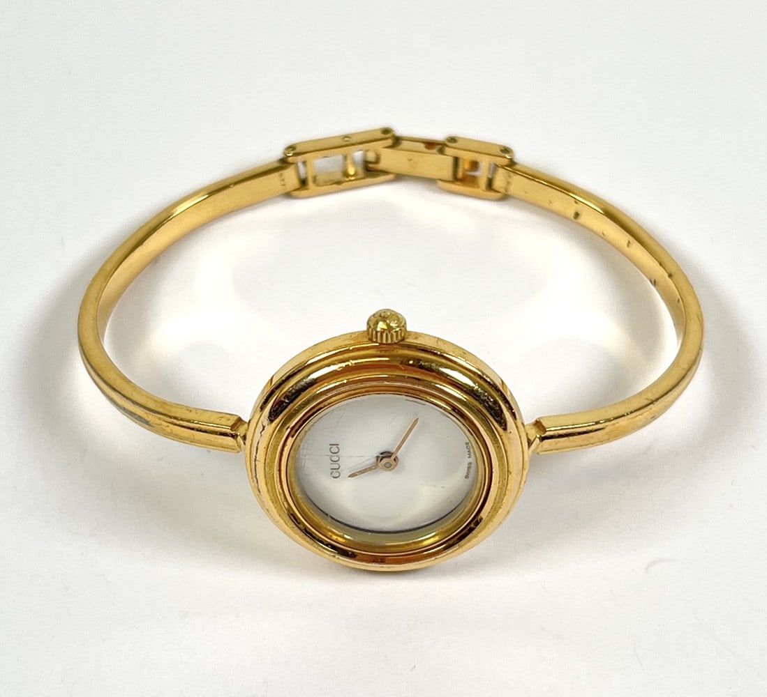 GUCCI LADIES YELLOW TONED WATCH: RUNNING.